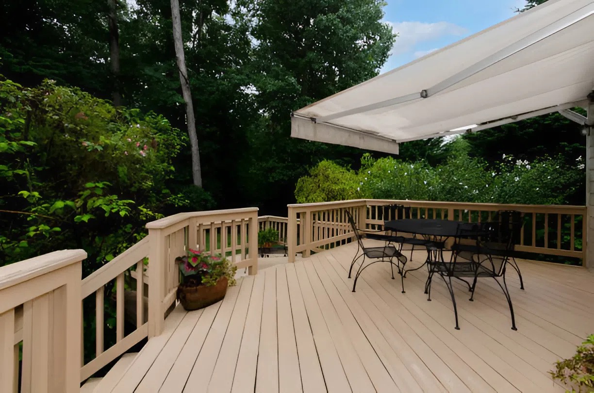Freshly painted backyard deck restored by a professional painting company in Portage, MI