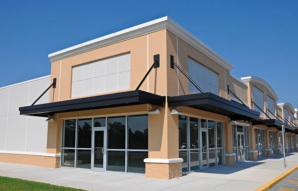 Freshly painted commercial building with smooth beige walls and crisp trim by a painting company in Plainwell, MI