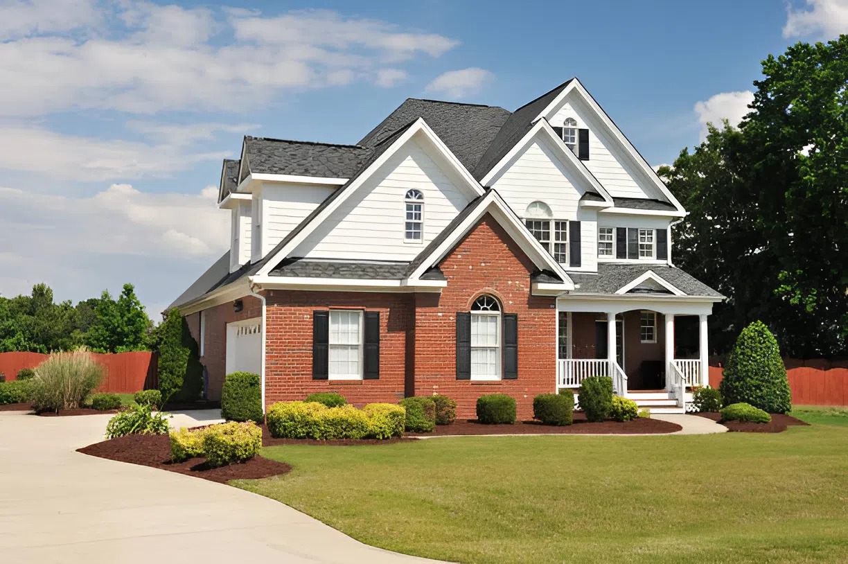 Home exterior with freshly painted siding and trim with durable finishes applied by an exterior painter in Plainwell, MI