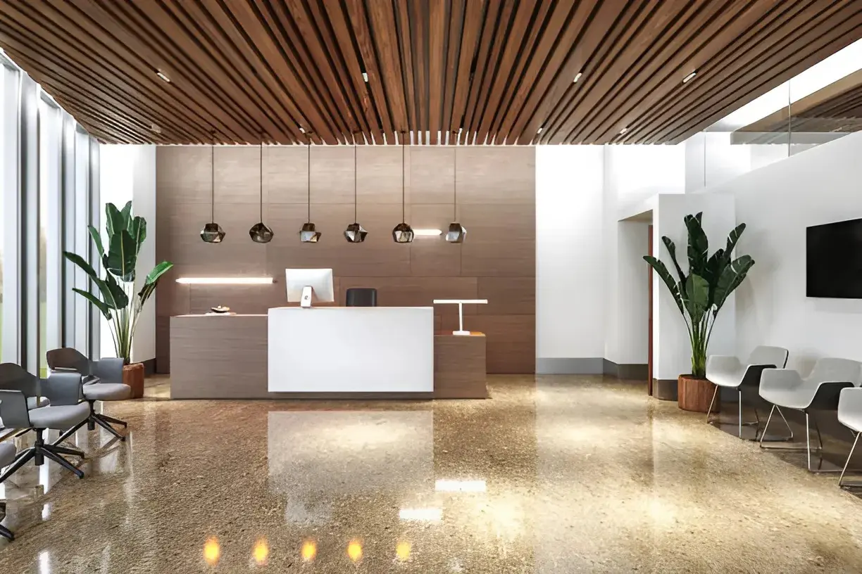 Reception area with freshly painted neutral walls and wood accents by a painting company in Portage, MI