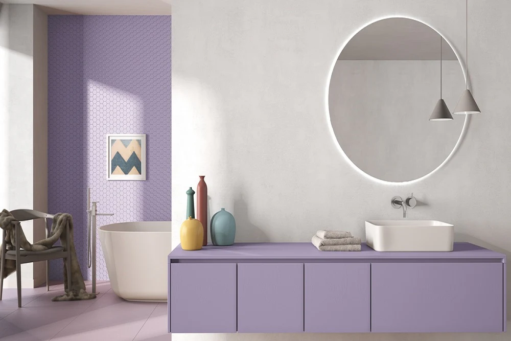 Modern lavender bathroom vanity and accent wall by an interior painter in Mattawan, MI