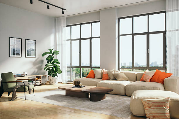 Modern living room painted with soft neutral wall colors and clean finishes by an interior painter in Plainwell, MI.